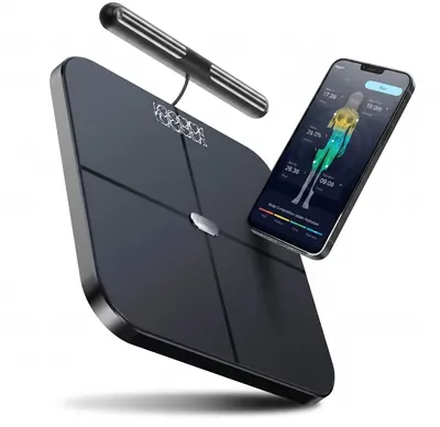 DEXA-grade body composition scan included with every Booty Bootcamp resident event — smart scale with grip handle and companion app showing body fat, muscle mass and visceral fat analysis